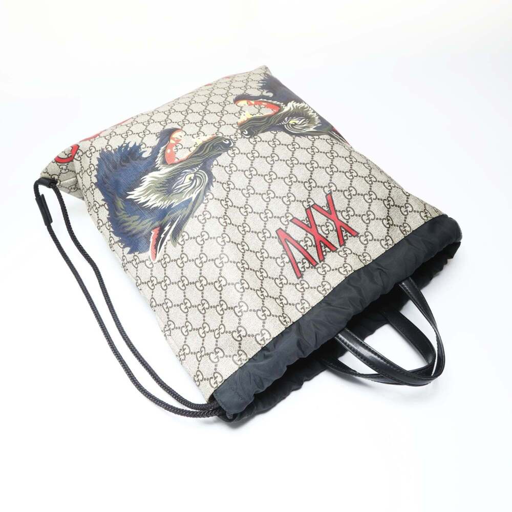 Gucci GG Supreme Drawstring Wolf Backpack, Brown,… - image 8